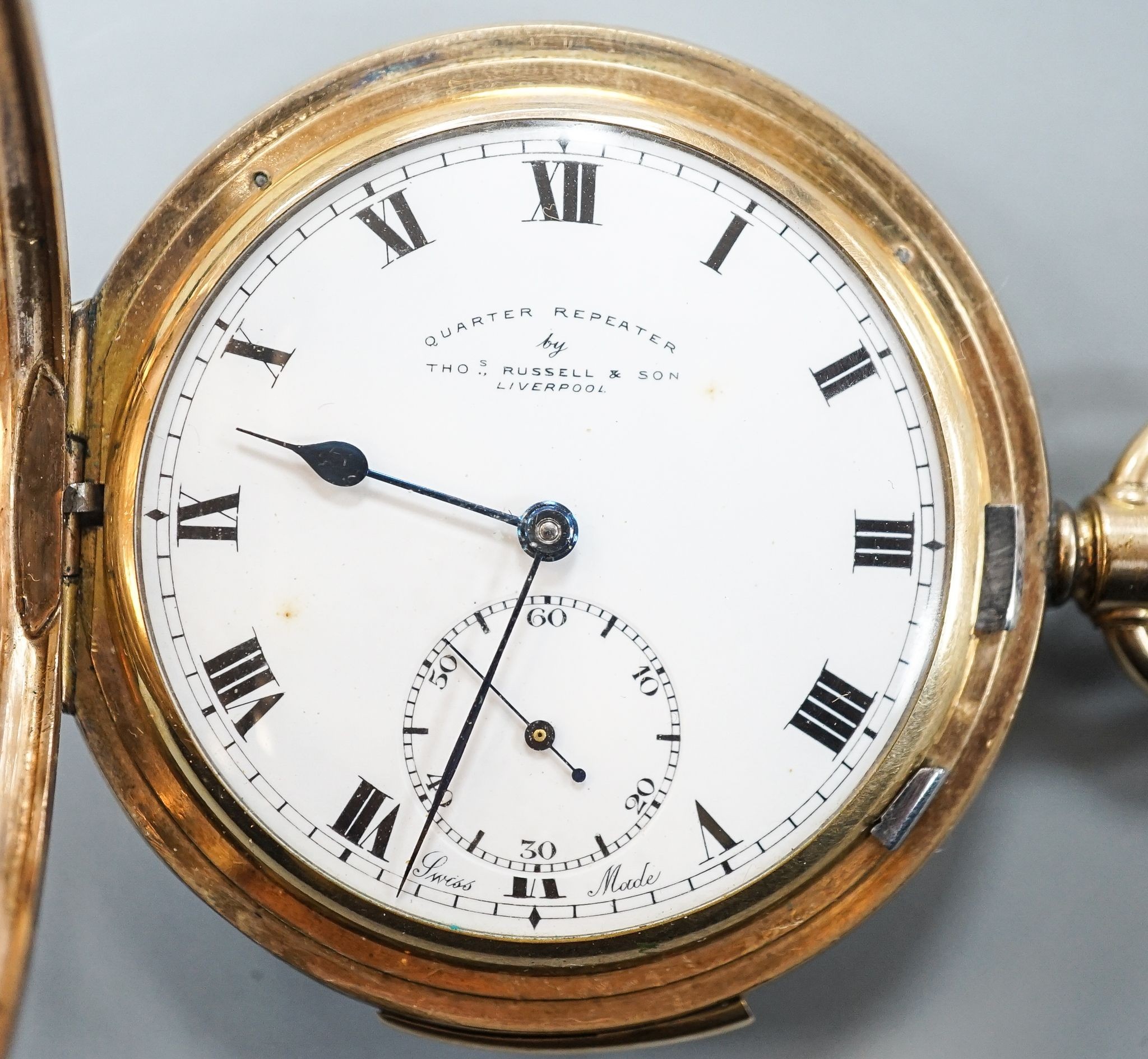 An early 20th century gold plated quarter repeating hunter keyless pocket watch by Thomas Russell & Son, Liverpool, with Roman dial and subsidiary seconds, case diameter 57mm.